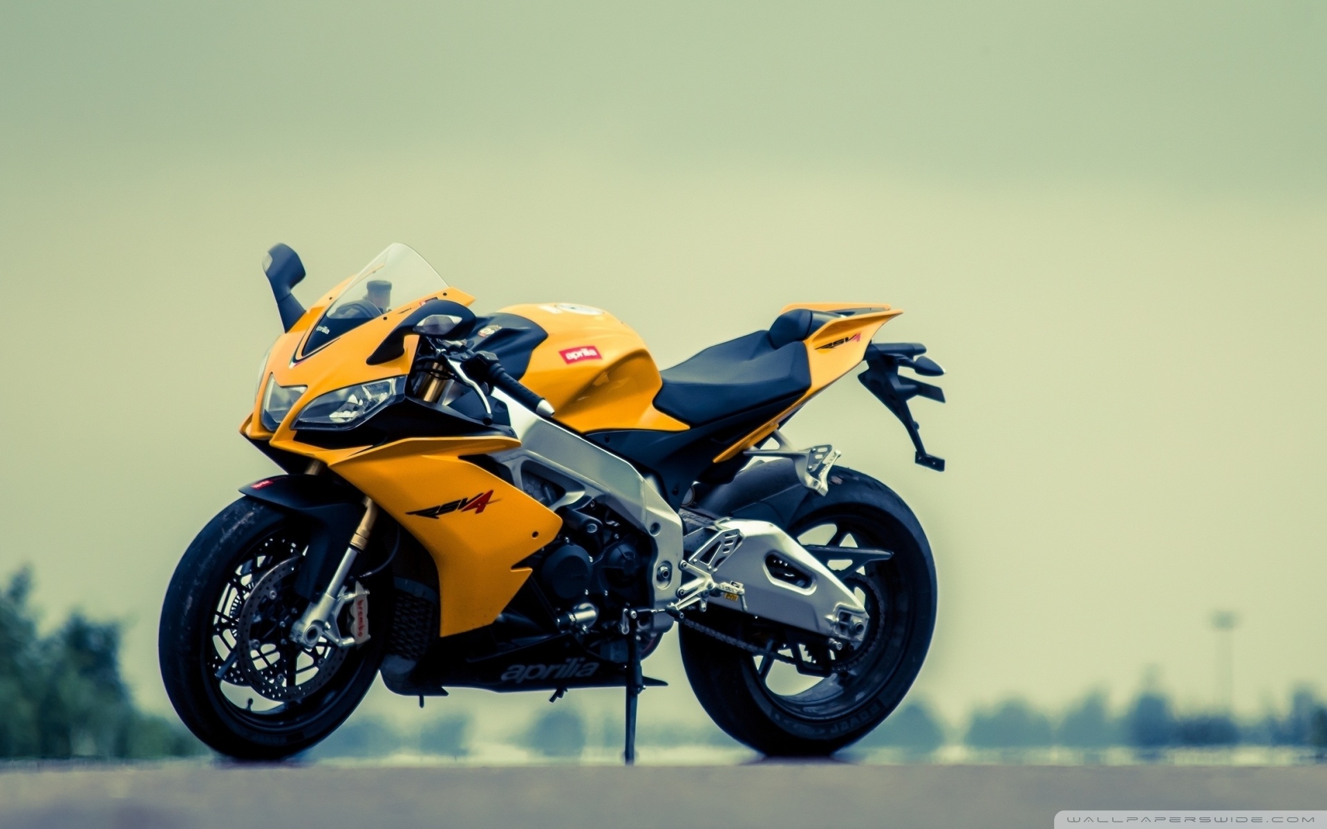 Aprilia RSV4 Yellow Motorcycle Ultra HD Desktop Background Wallpaper 